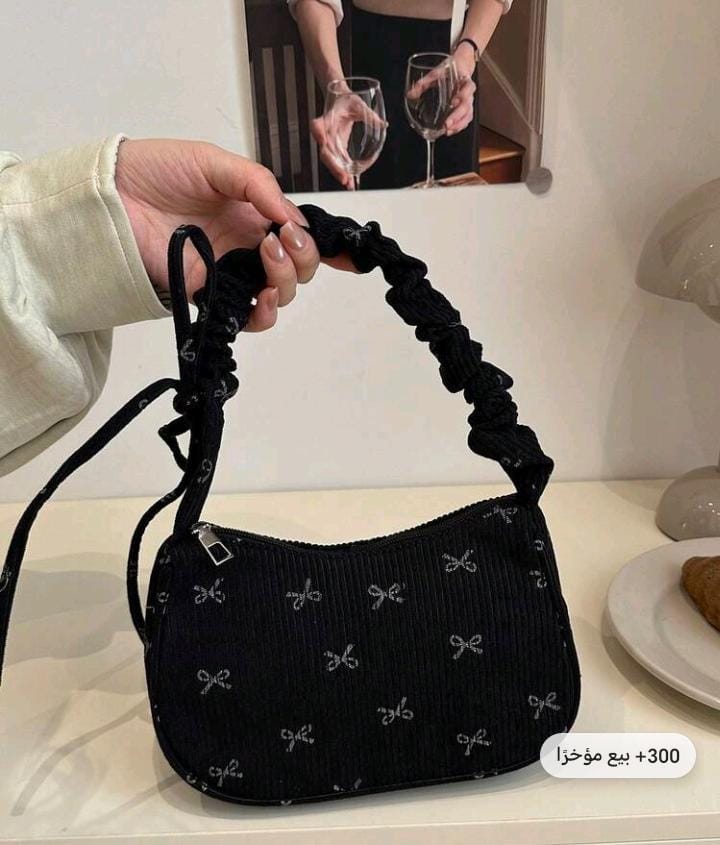 شنطة يد سوداء